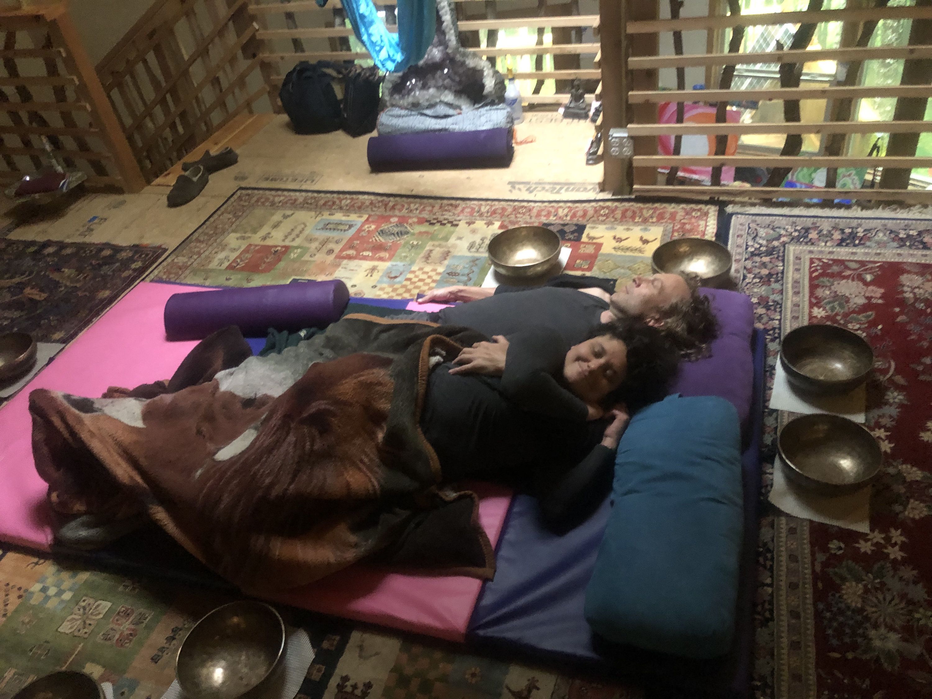 07 couple embracing, surrounded by singing bowls