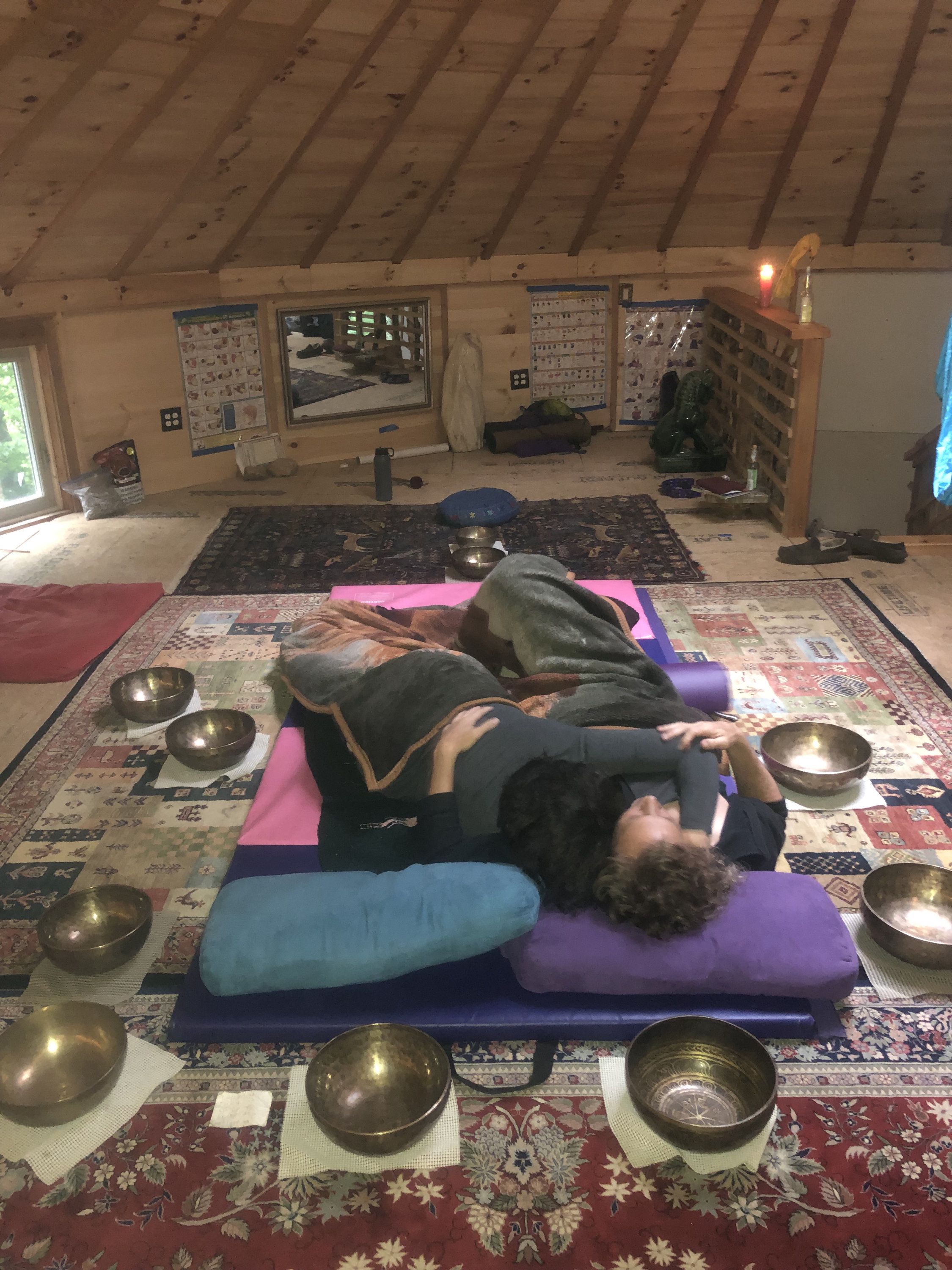 15 couple embracing, surrounded by singing bowls