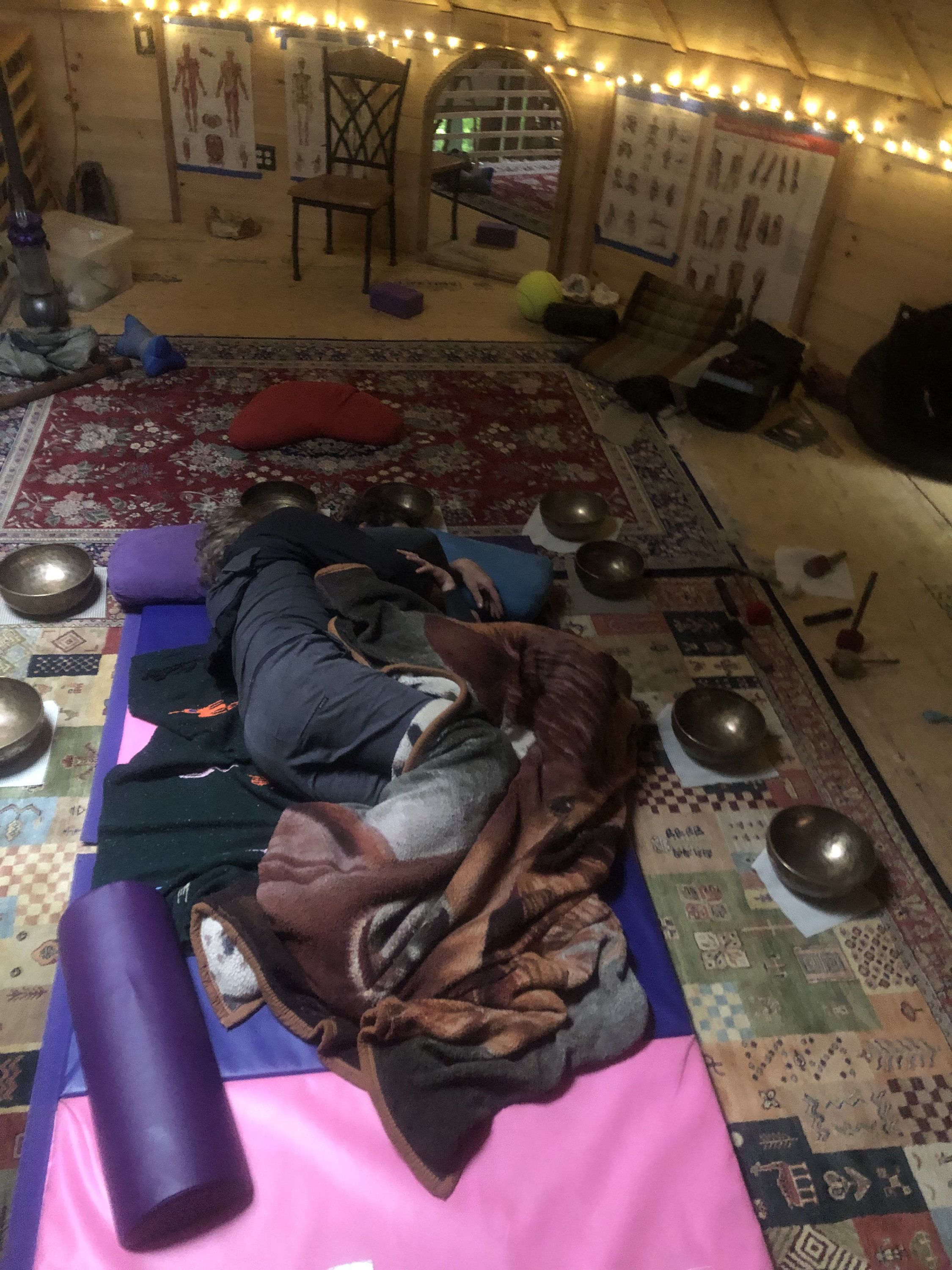 35 couple embracing, surrounded by singing bowls