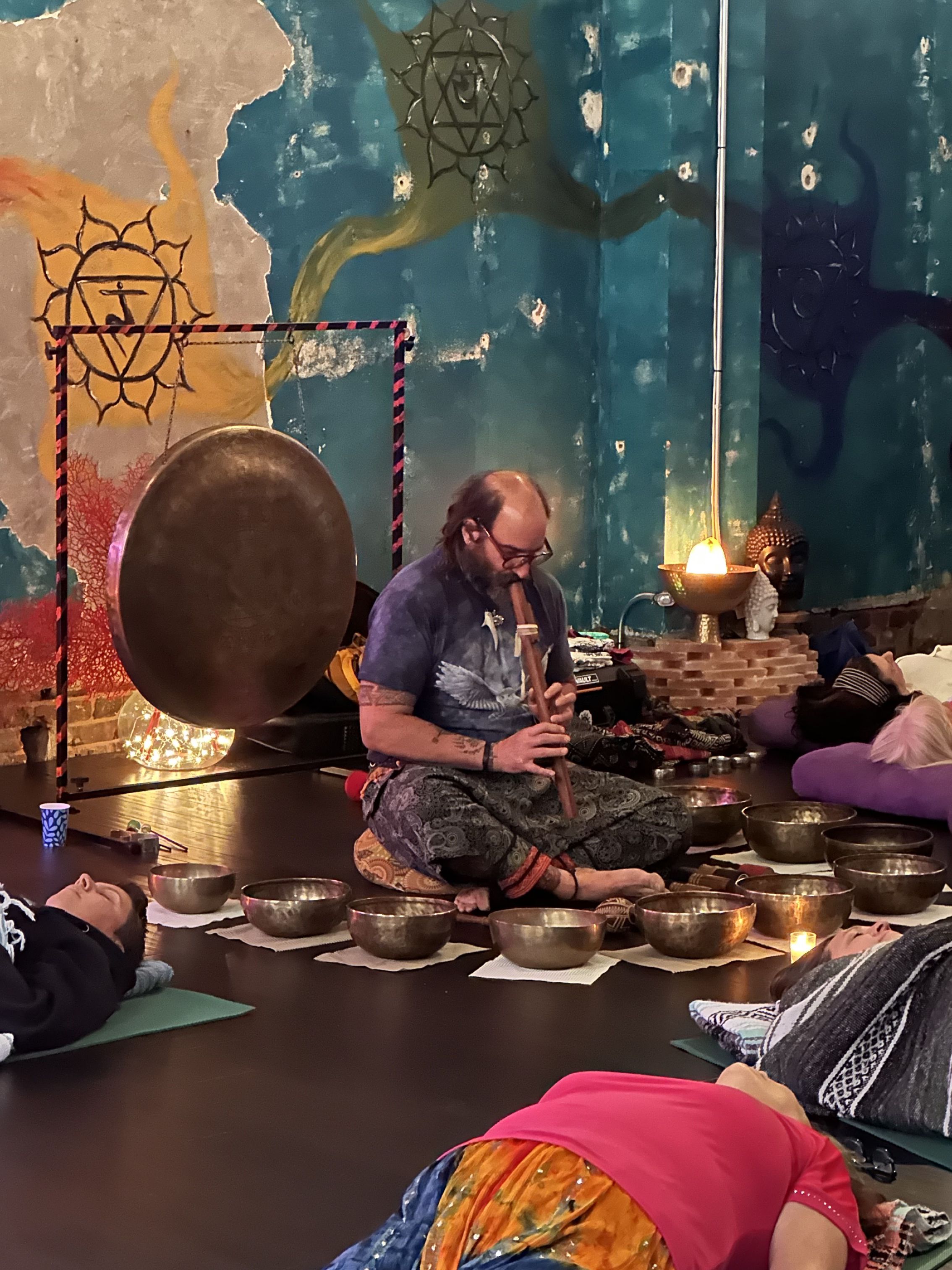 Christian playing flute for group